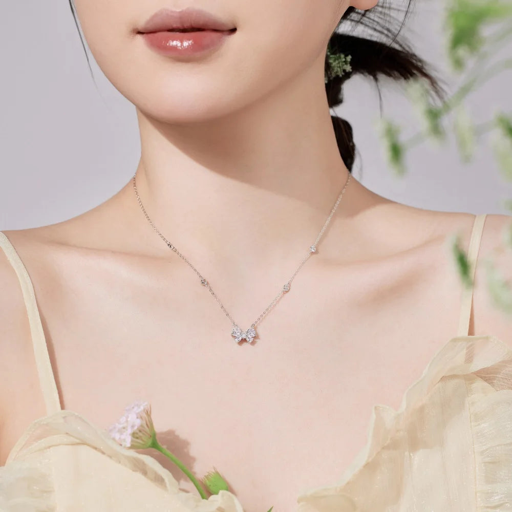 Silver Zircon Trillion Curved Cut Bow Pendant Necklace