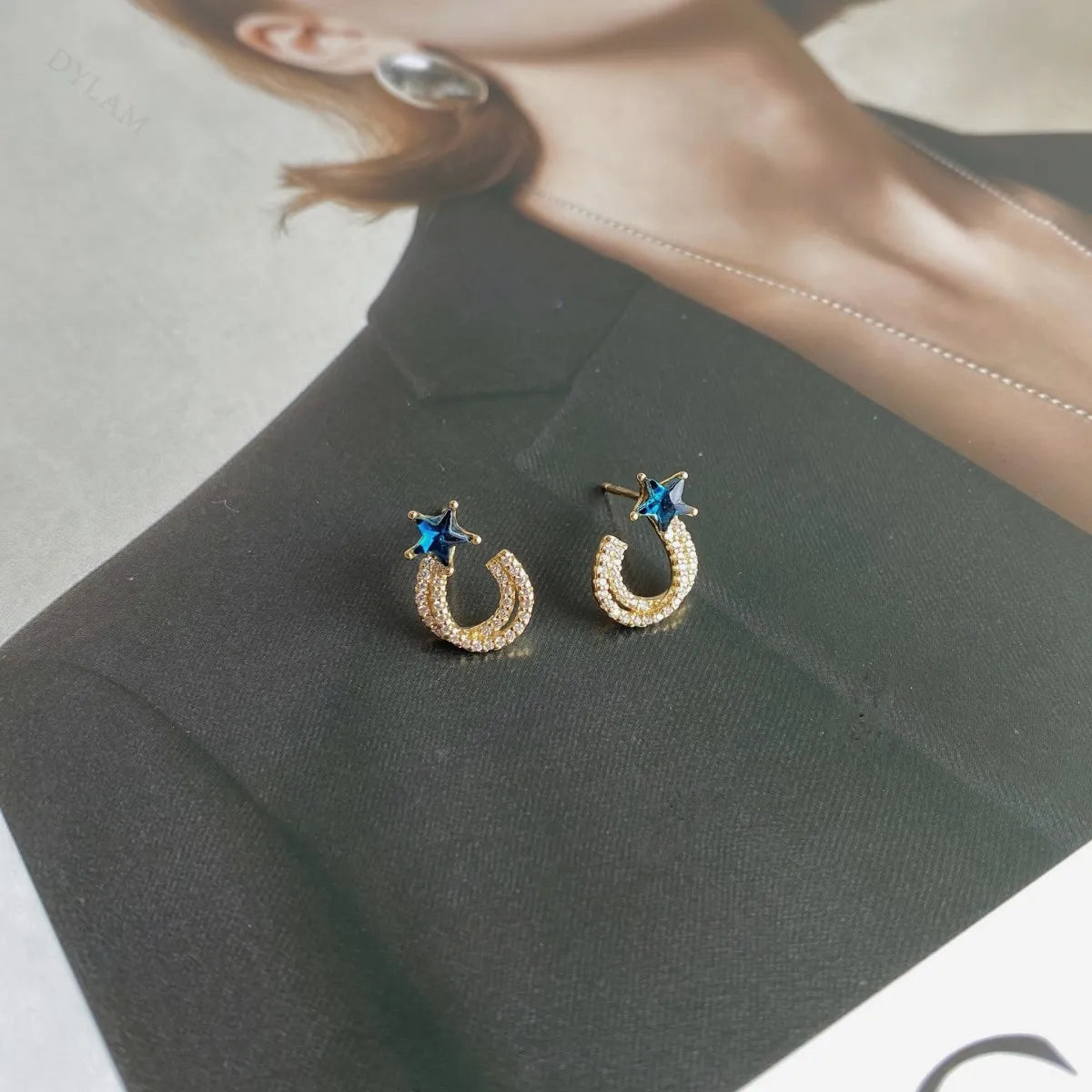 Silver Zircon Star Cut Iced Twisted Ear Studs