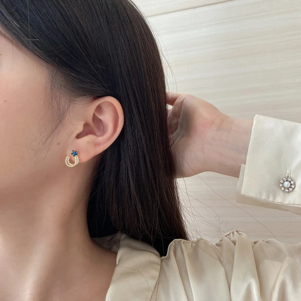 Silver Zircon Star Cut Iced Twisted Ear Studs