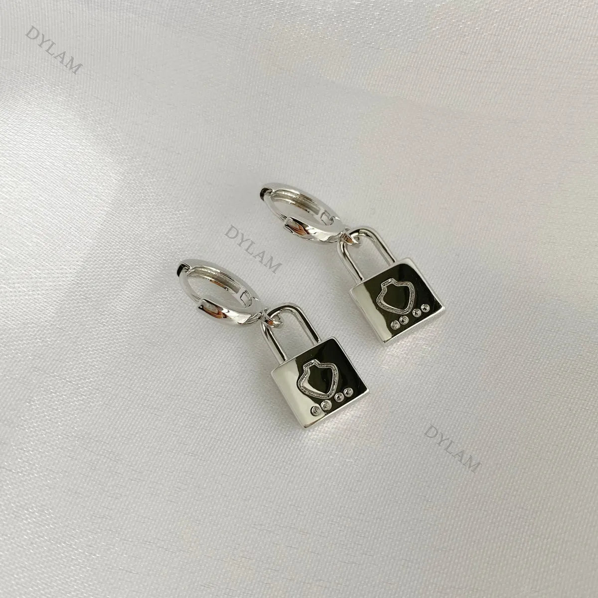 Silver Drop Lock Huggie Earrings