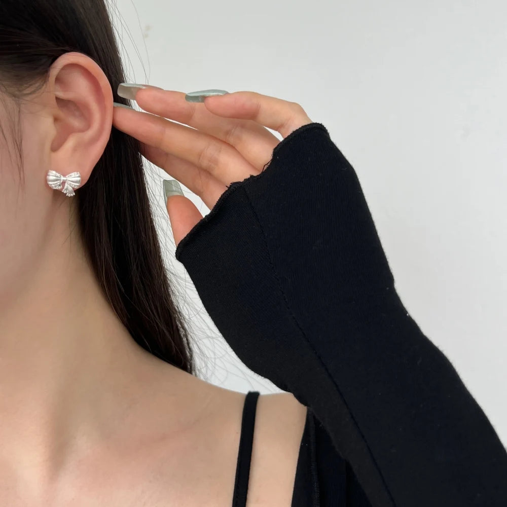 Silver Zircon Round Cut Bow Tie Ear Studs