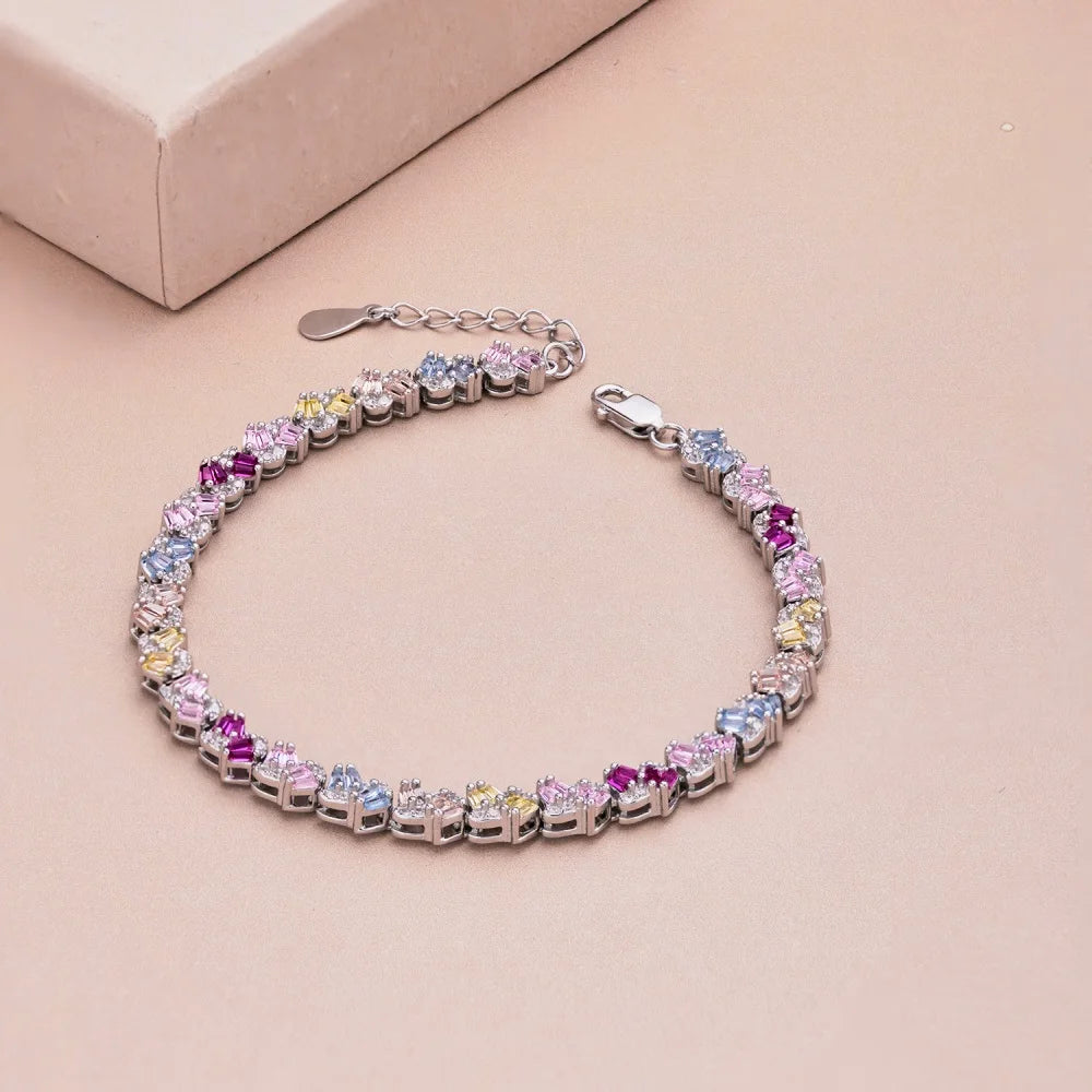 Silver Zircon Tapered Baguette Cut Twisted Multi Shape Tennis Bracelet