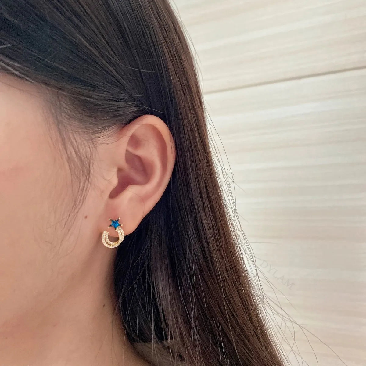 Silver Zircon Star Cut Iced Twisted Ear Studs