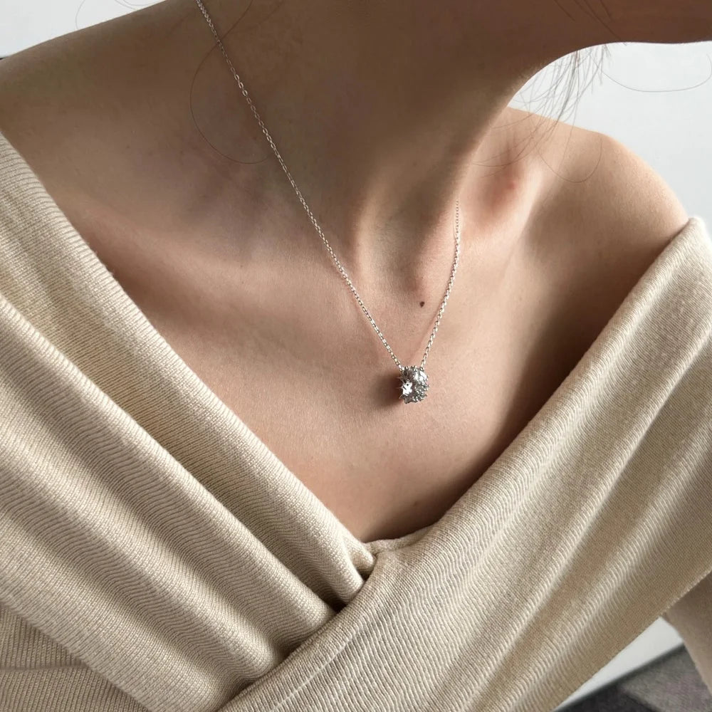 Silver Zircon Baguette Cut Twisted Cylinder Pendant Necklace
