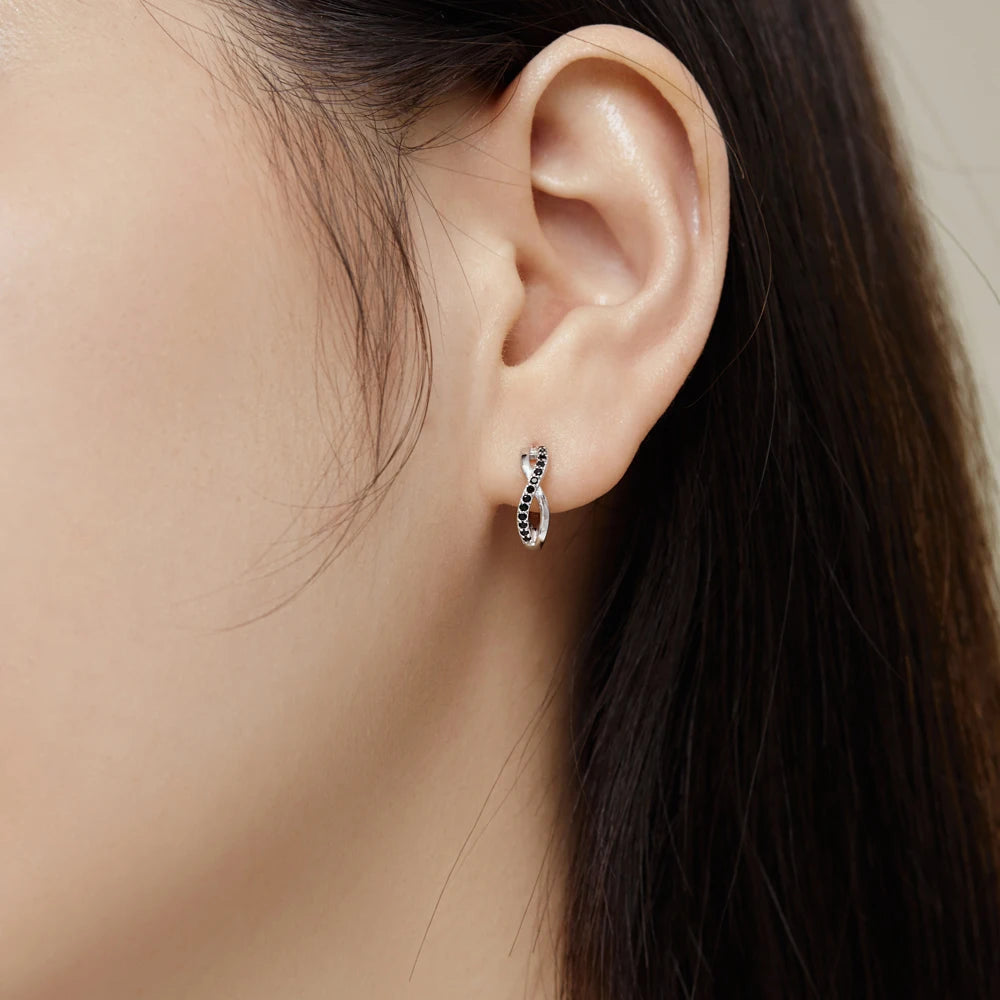 Silver Zircon Round Cut Iced Twisted Huggie Earrings