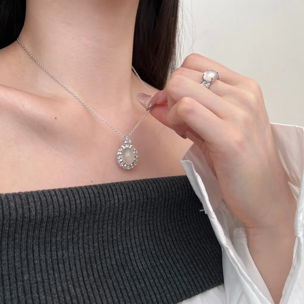 Silver Chalcedony Oval Cut Halo Flower Pendant Necklace