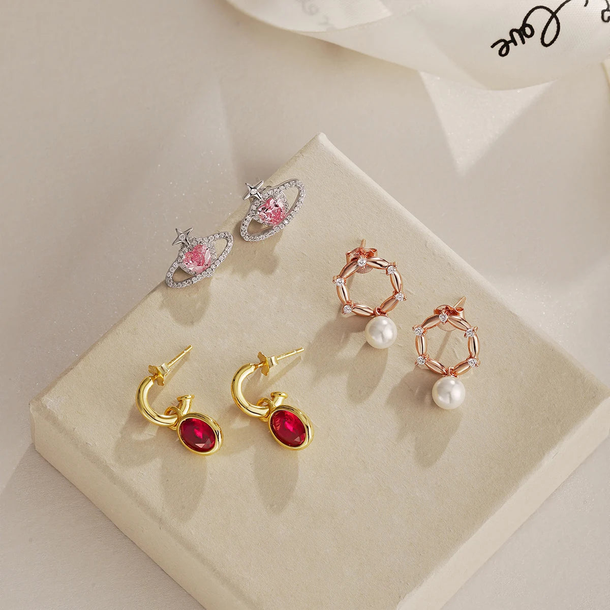 Silver Zircon Heart Cut Planet Ear Studs