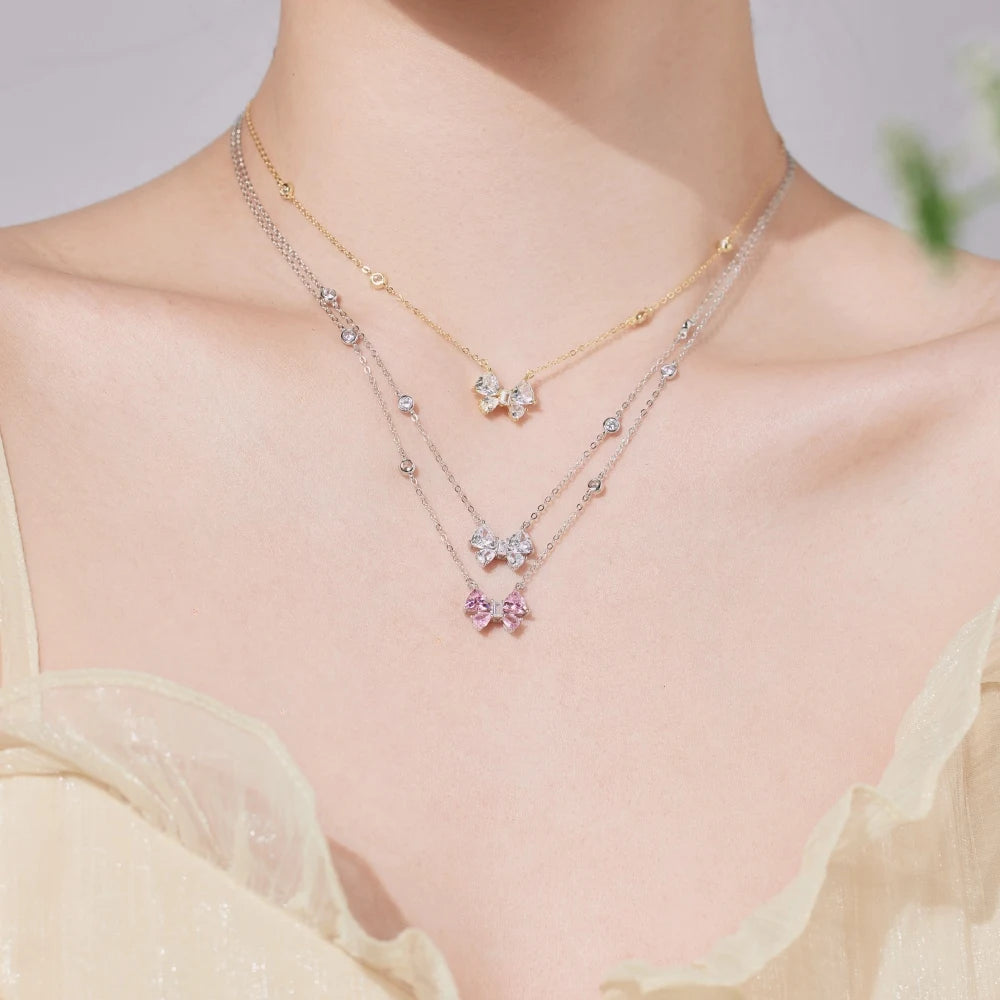 Silver Zircon Trillion Curved Cut Bow Pendant Necklace