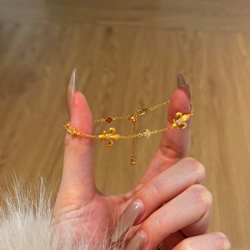 Silver Zircon Round Cut Fleur-De-Lis Charm Bracelet