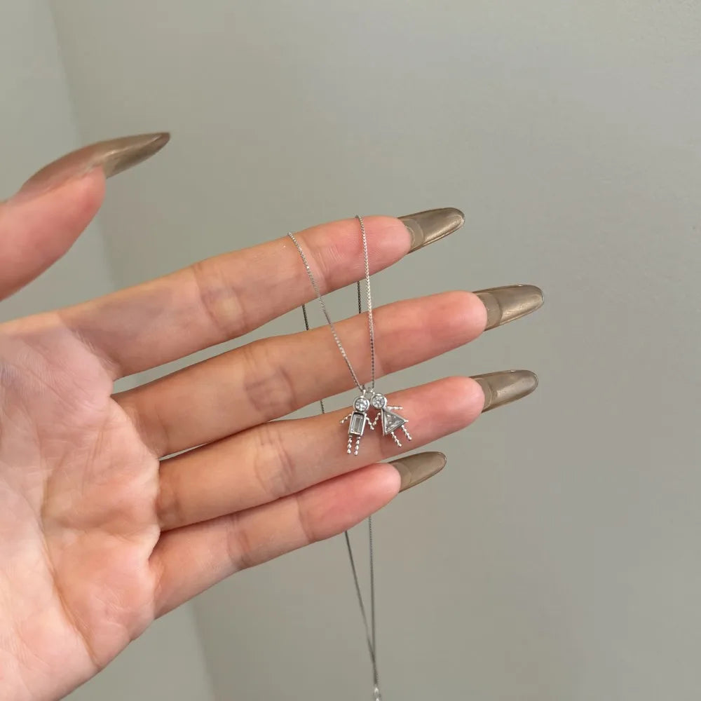 Silver Zircon Triangle Cut Girl & Boy Pendant Necklace