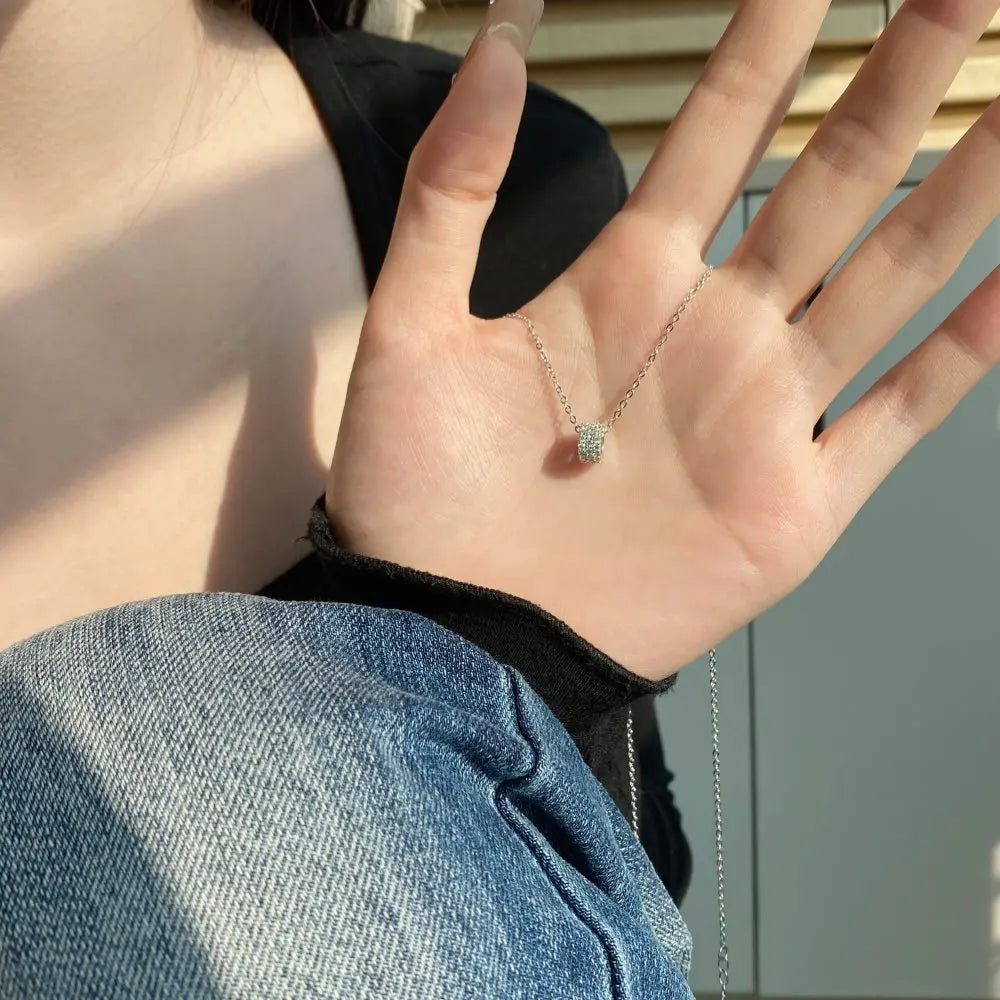 Silver Zircon Round Cut Rolling Pendant Necklace