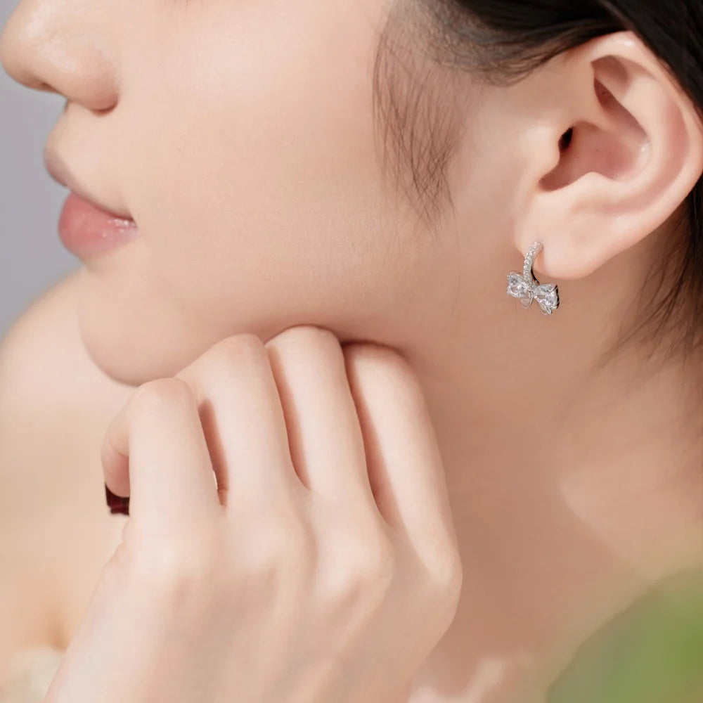 Silver Zircon Heart Cut Bow Huggie Earrings