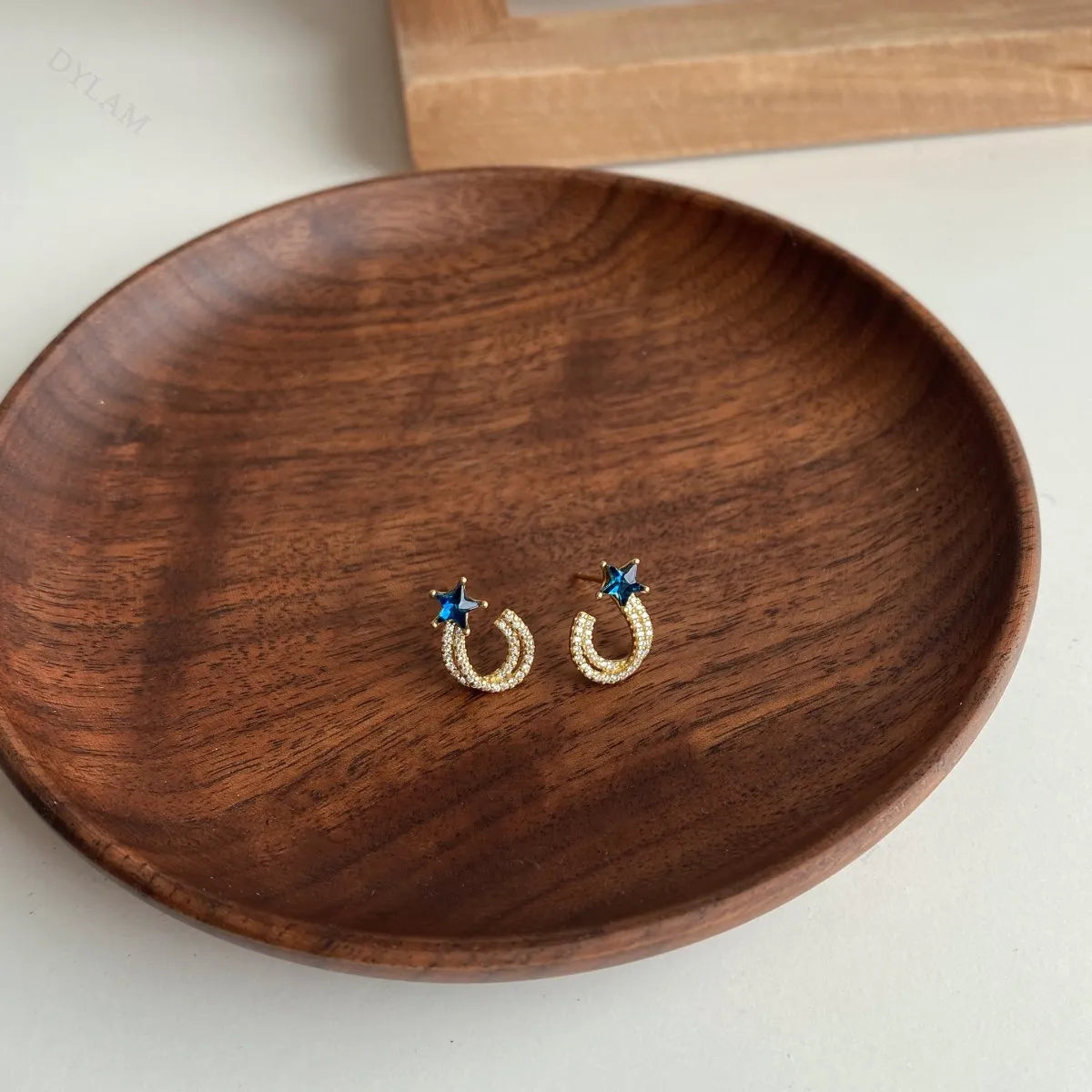 Silver Zircon Star Cut Iced Twisted Ear Studs