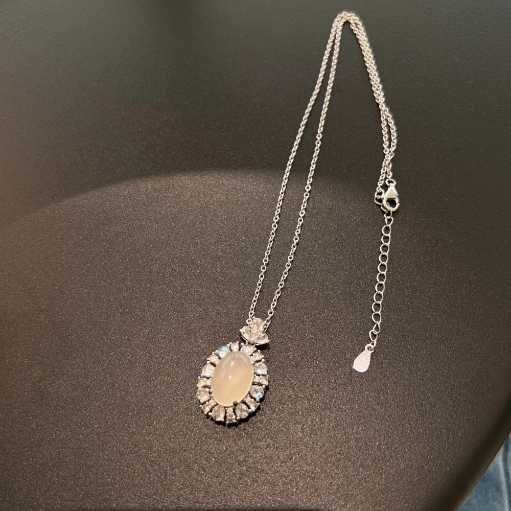 Silver Chalcedony Oval Cut Halo Flower Pendant Necklace