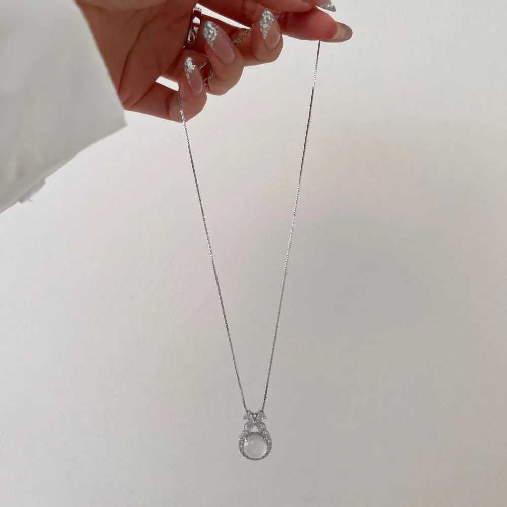 Silver Jade Cut Bow Pendant Necklace
