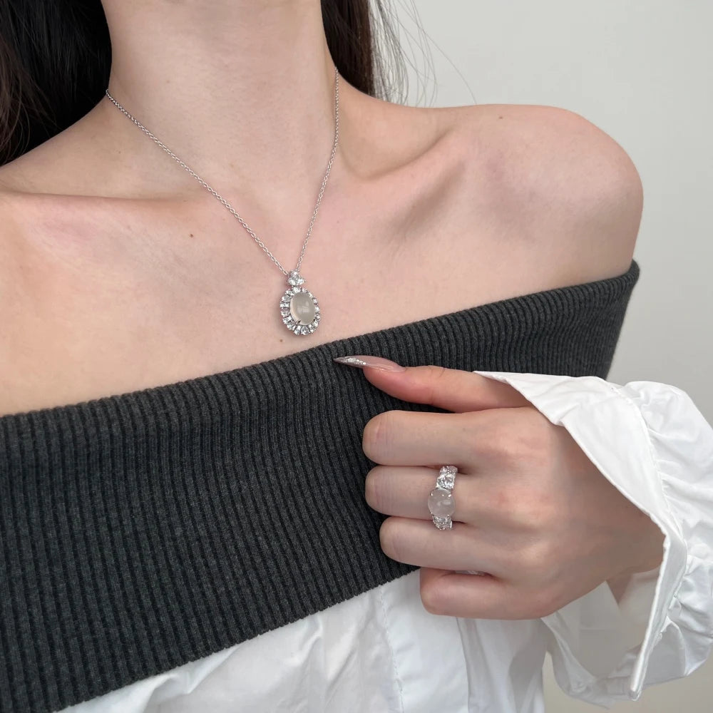 Silver Chalcedony Oval Cut Halo Flower Pendant Necklace