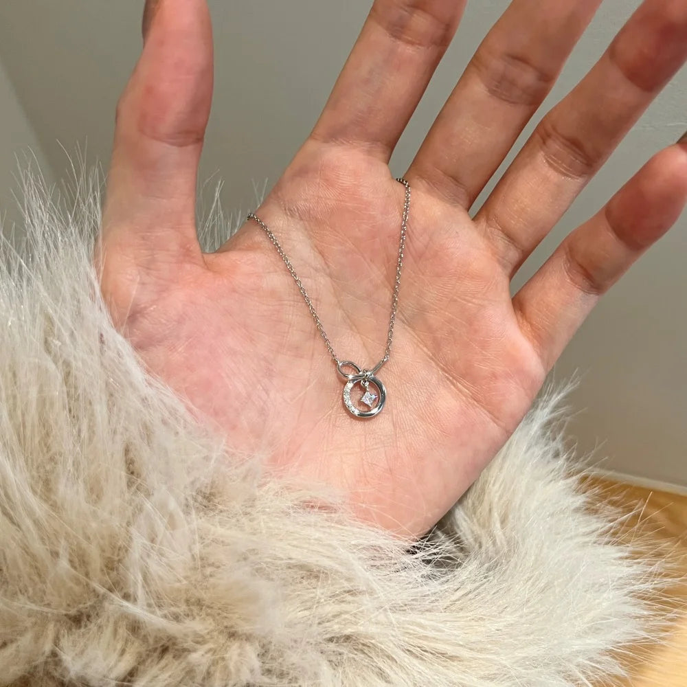 Silver Zircon Princess Cut Twisted Bow Knot Pendant Necklace