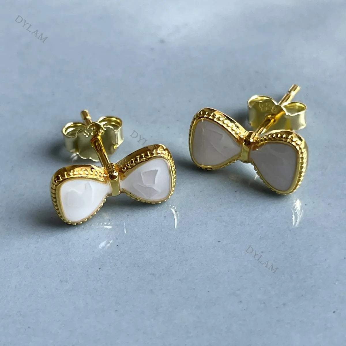 Silver Bow Tie Ear Studs