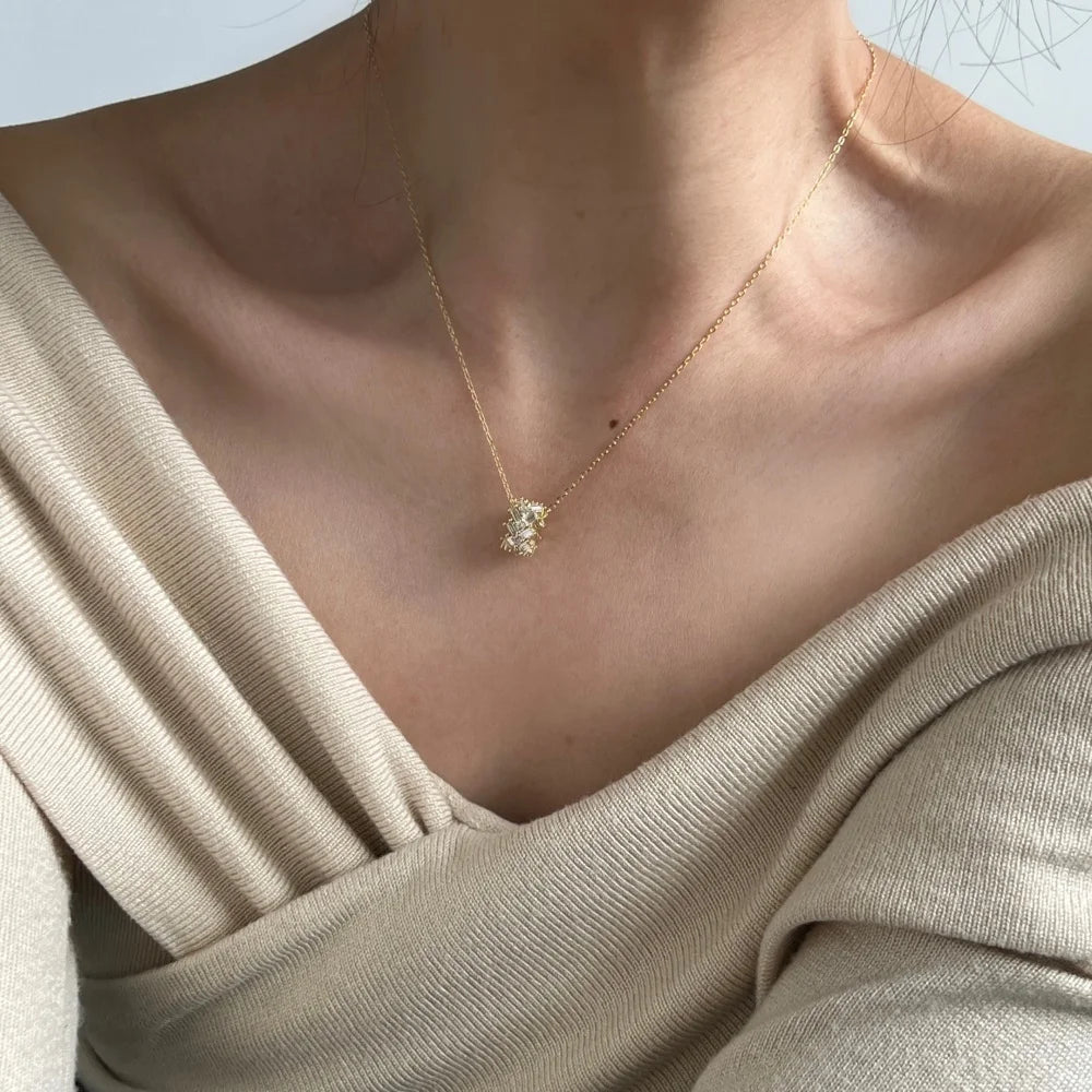 Silver Zircon Baguette Cut Twisted Cylinder Pendant Necklace