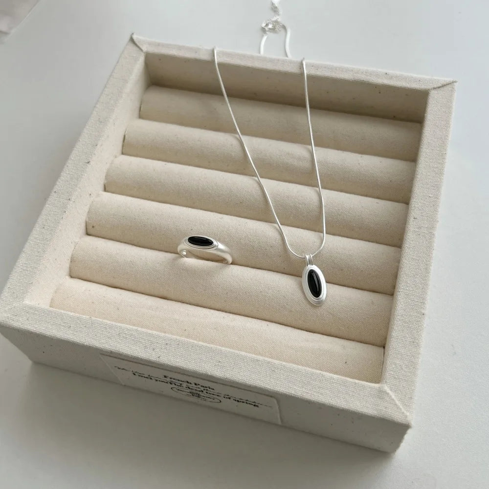 Silver Onyx Oval Cut Herringbone Pendant Necklace