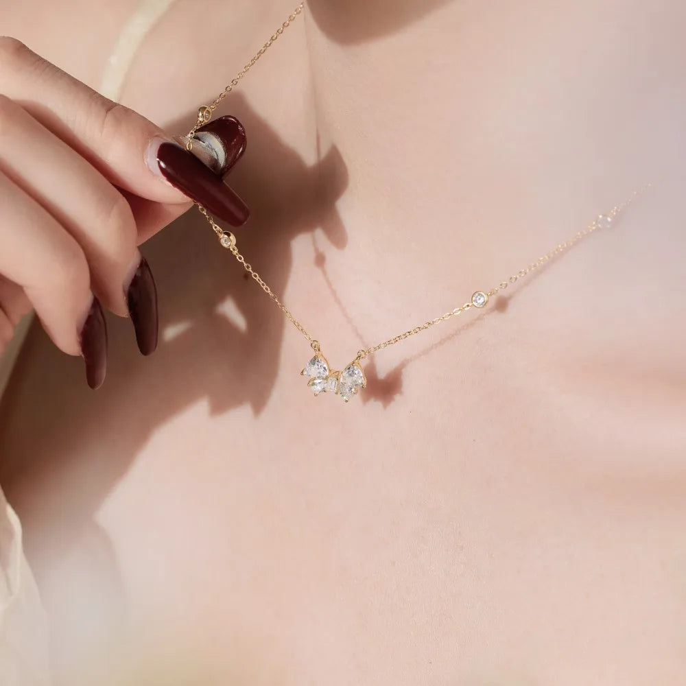 Silver Zircon Trillion Curved Cut Bow Pendant Necklace