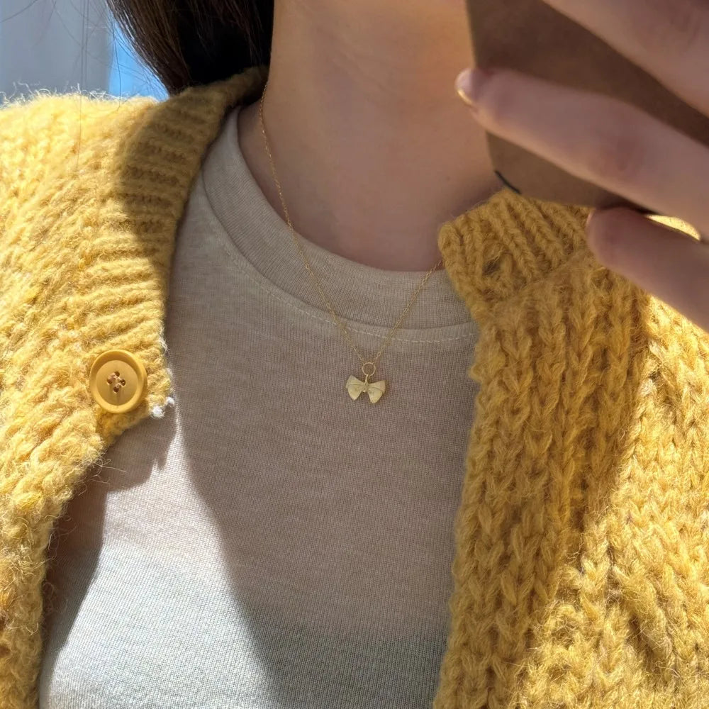 Silver Bow Pendant Necklace