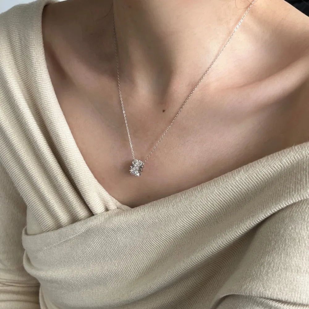 Silver Zircon Baguette Cut Twisted Cylinder Pendant Necklace