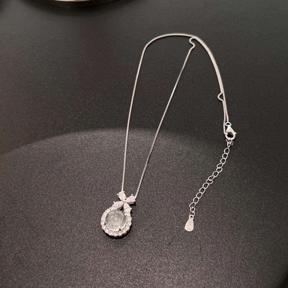 Silver Jade Cut Bow Pendant Necklace