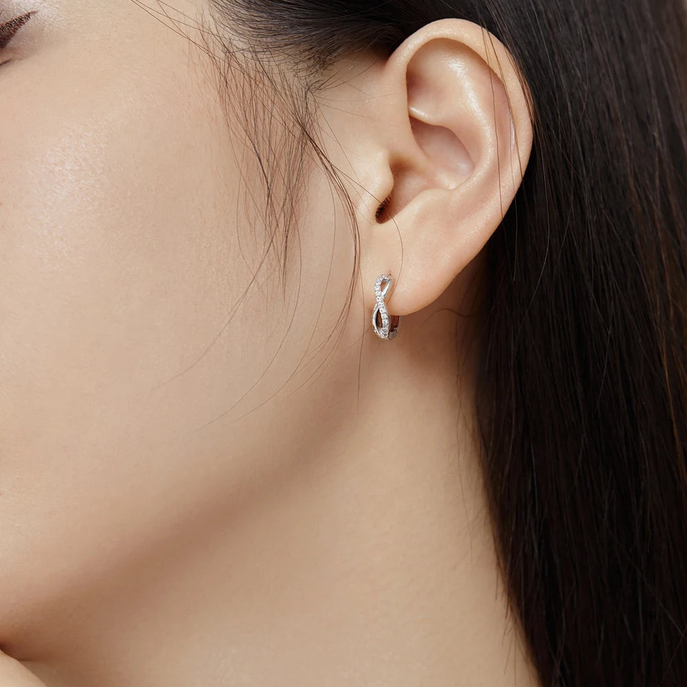 Silver Zircon Round Cut Iced Twisted Huggie Earrings