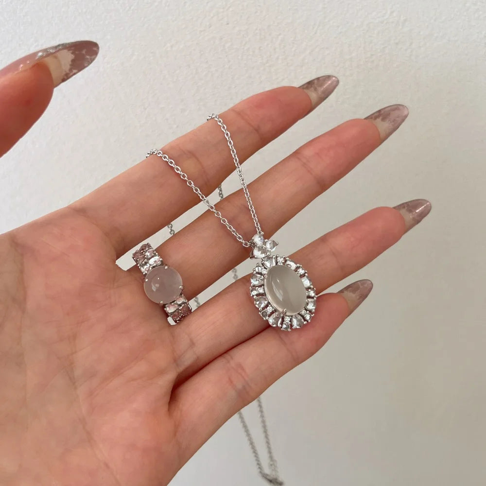 Silver Chalcedony Oval Cut Halo Flower Pendant Necklace