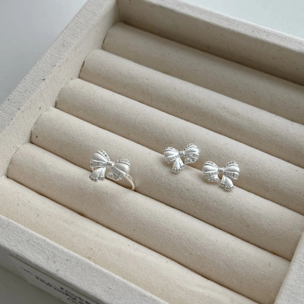 Silver Zircon Round Cut Bow Tie Ear Studs