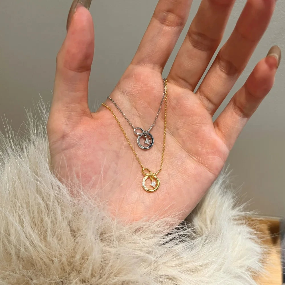 Silver Zircon Princess Cut Twisted Bow Knot Pendant Necklace