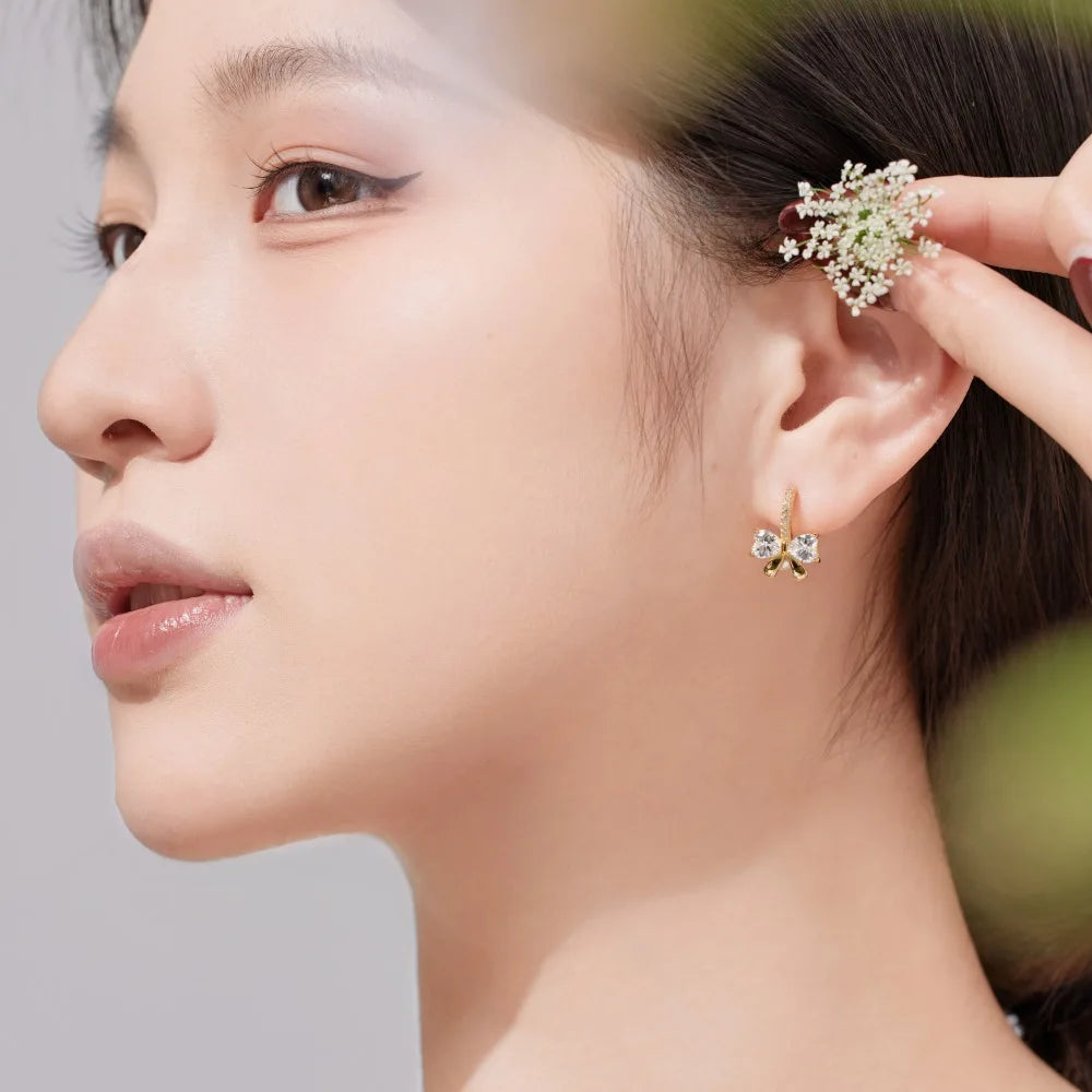 Silver Zircon Heart Cut Bow Huggie Earrings