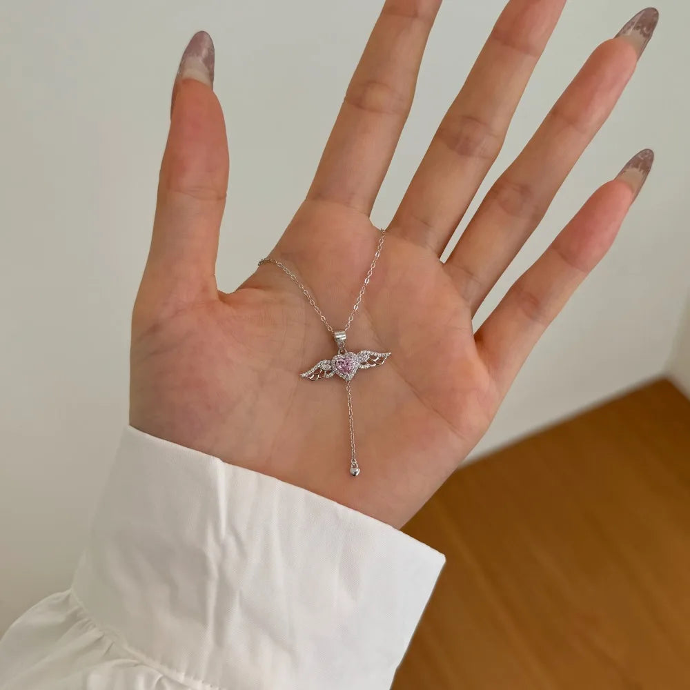 Silver Zircon Heart Cut Wings Pendant Necklace