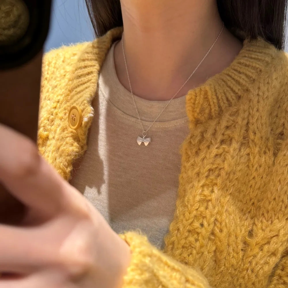 Silver Bow Pendant Necklace