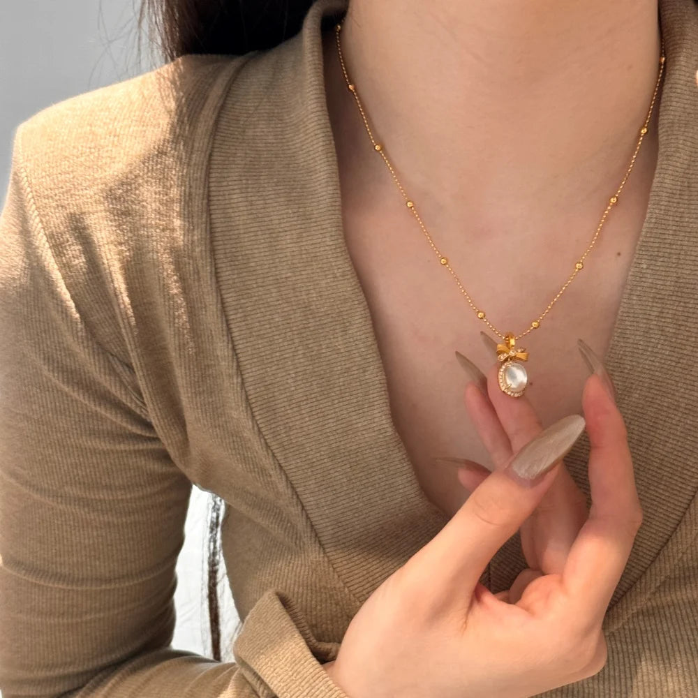 Silver Jade Cut Bow Knot Pendant Necklace