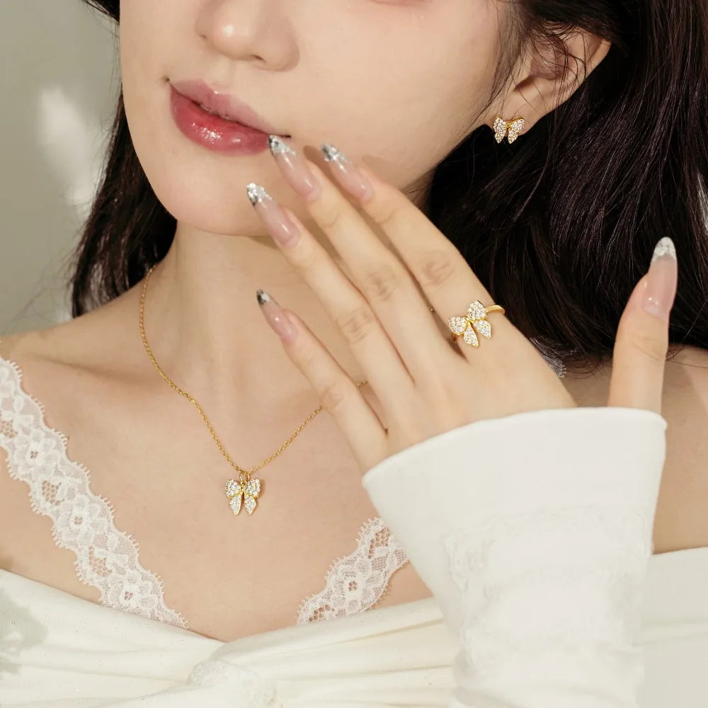 Silver Zircon Round Cut Iced Butterfly Ear Studs