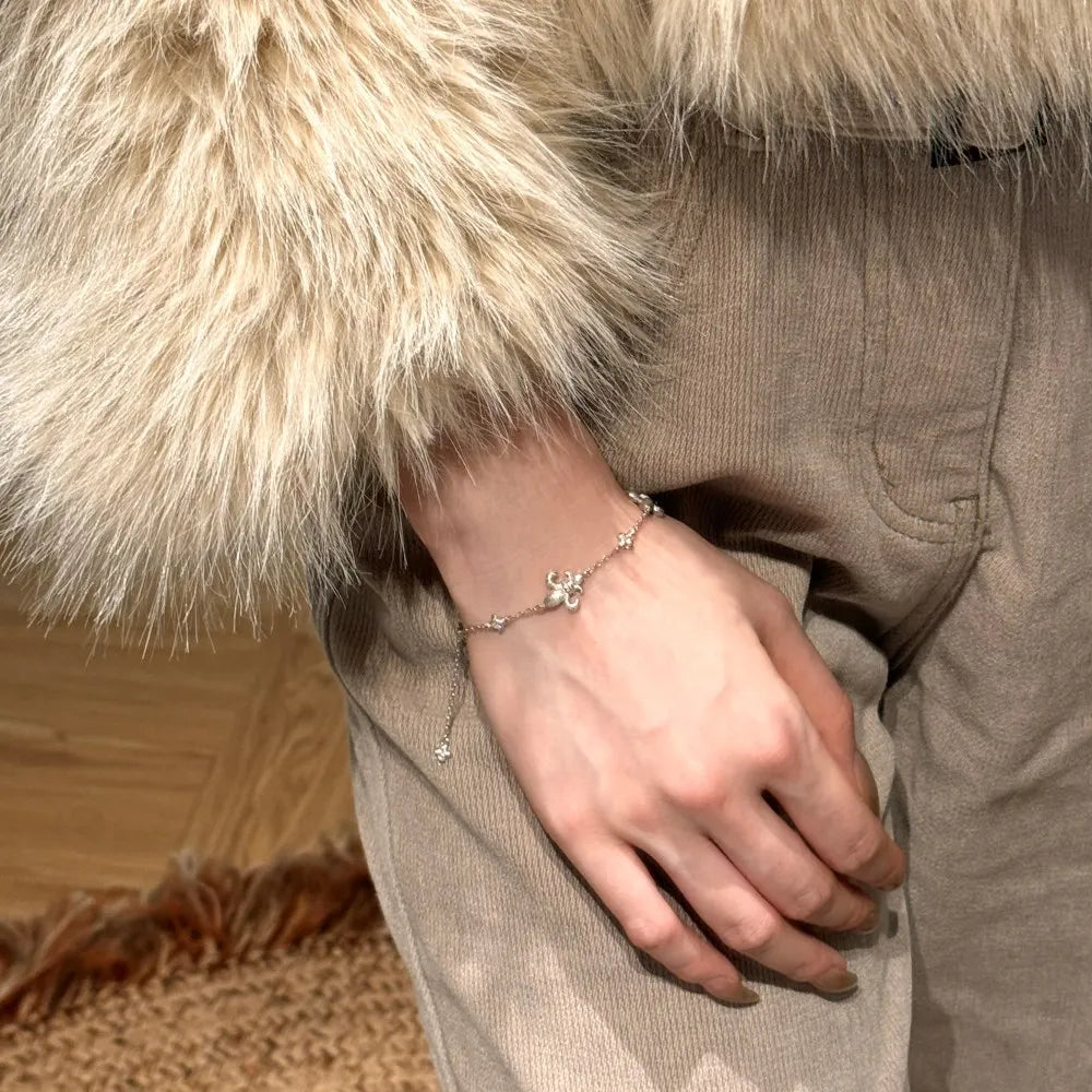 Silver Zircon Round Cut Fleur-De-Lis Charm Bracelet