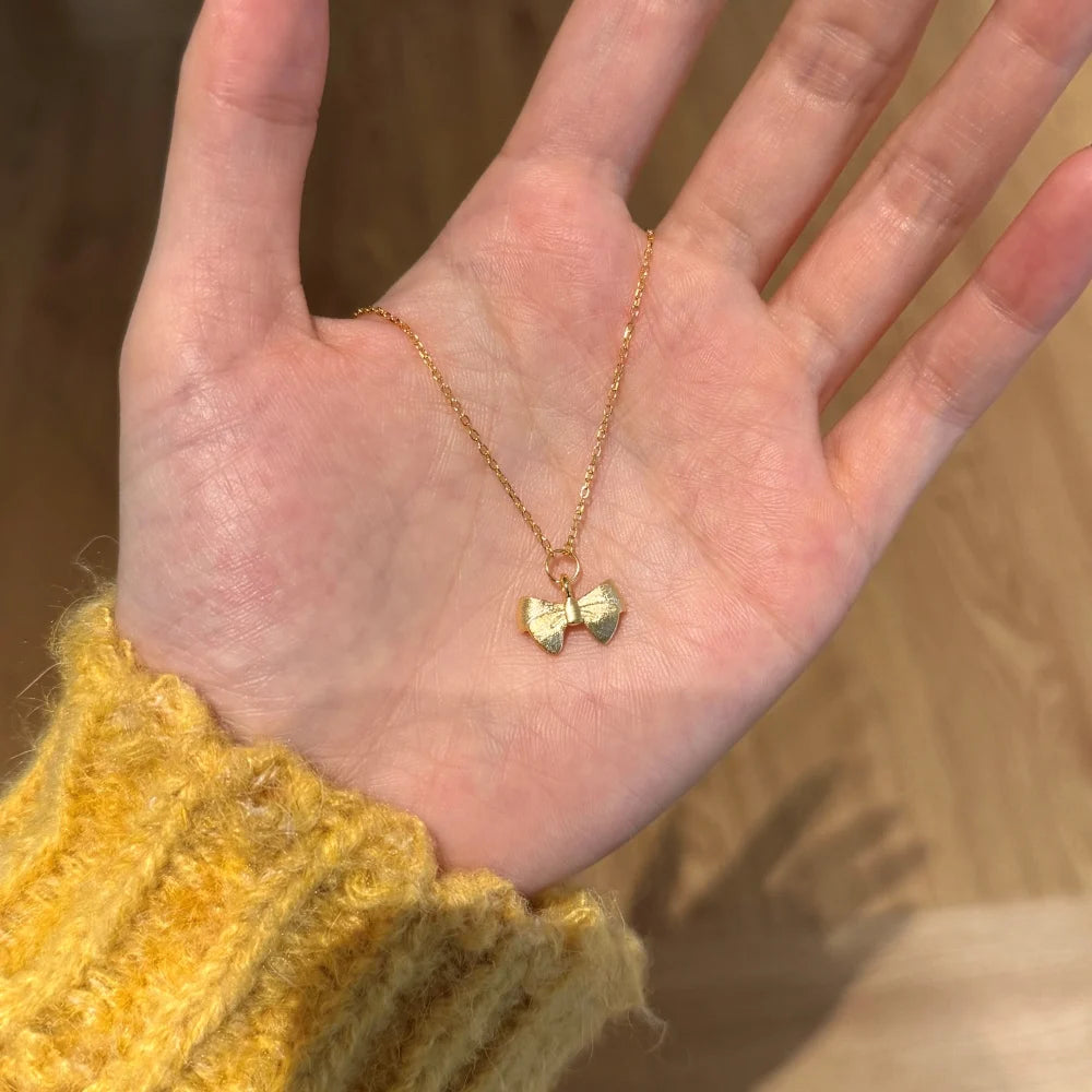 Silver Bow Pendant Necklace