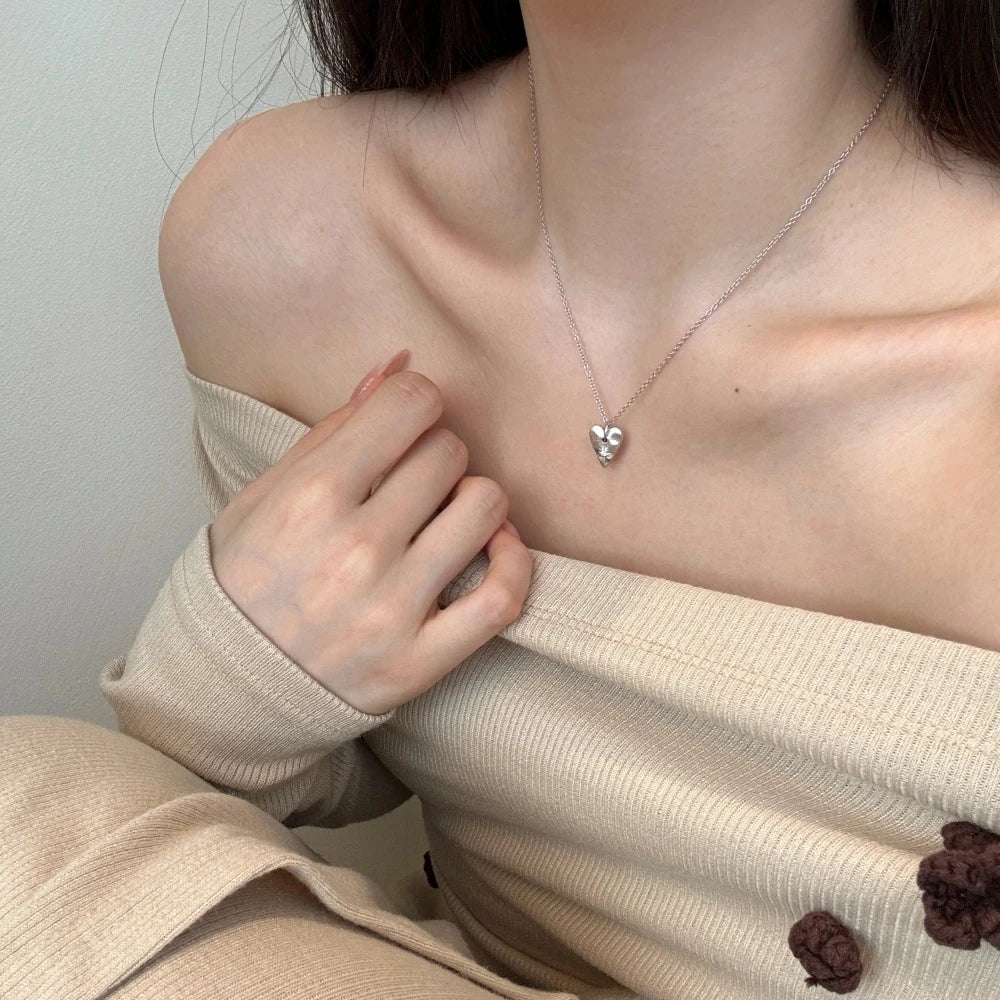 Silver Zircon Round Cut Melting Heart Pendant Necklace