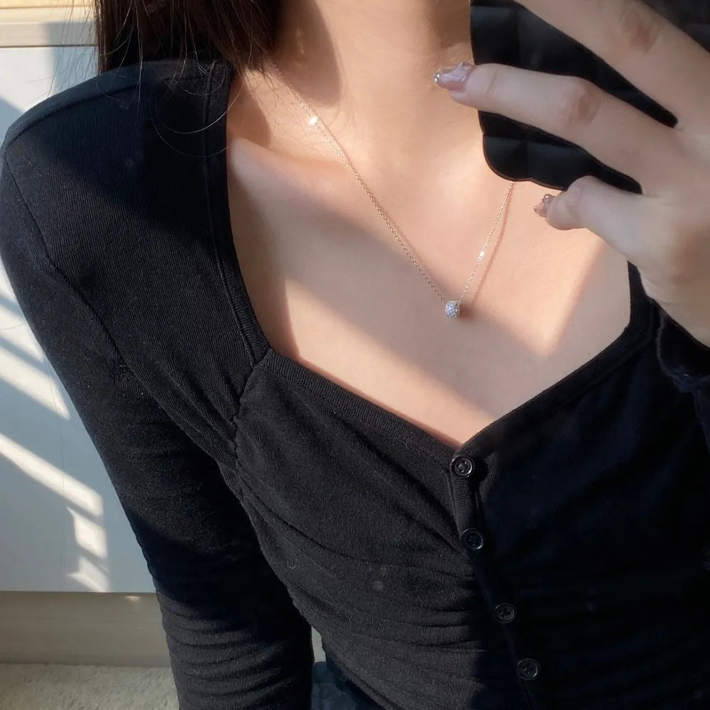 Silver Zircon Round Cut Rolling Pendant Necklace