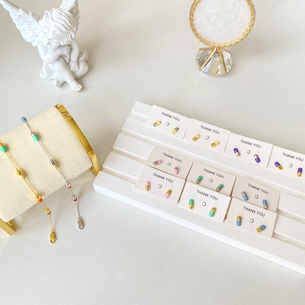 Silver Capsule Charm Bracelet