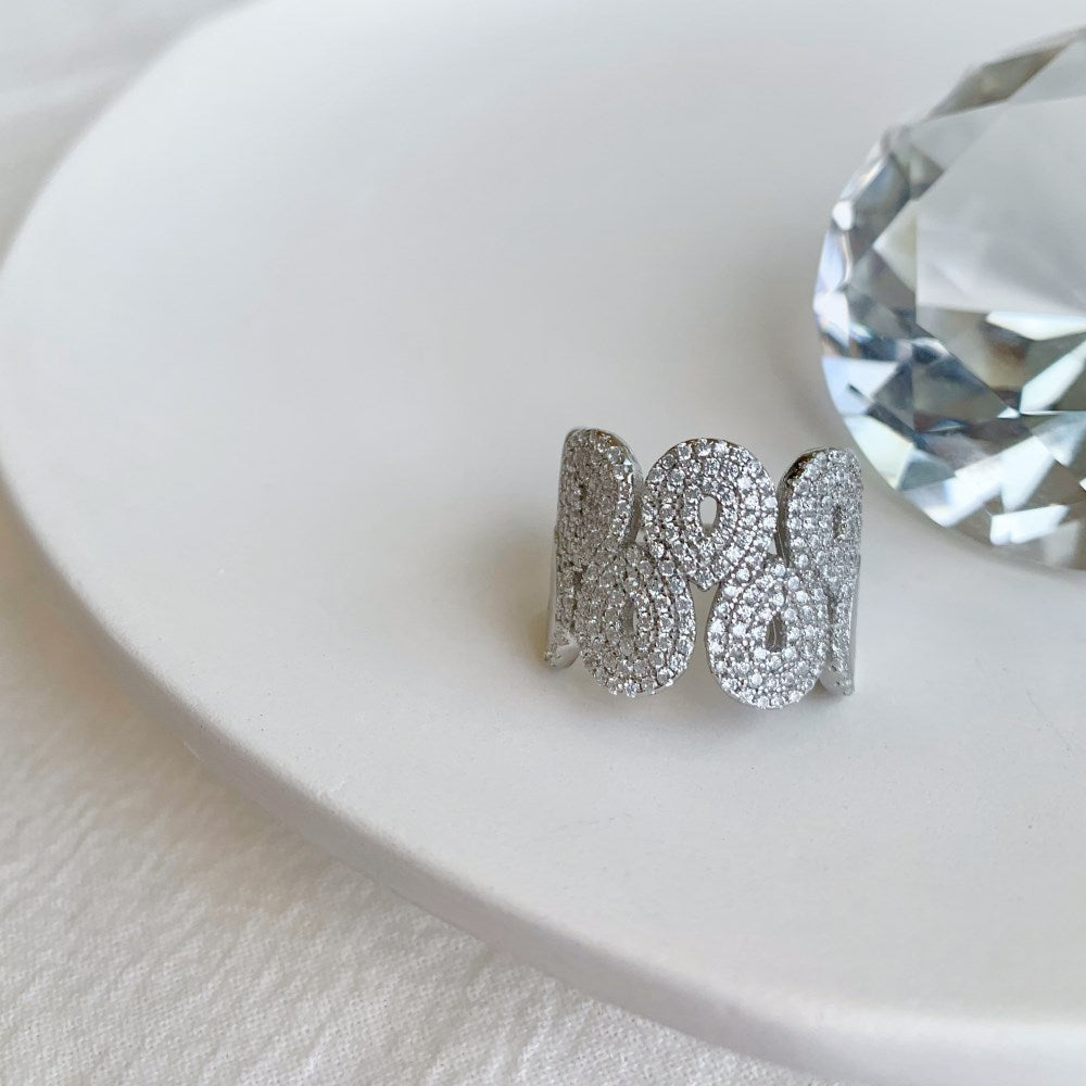 Silver Zircon Round Cut Iced Tube Crossover Ring