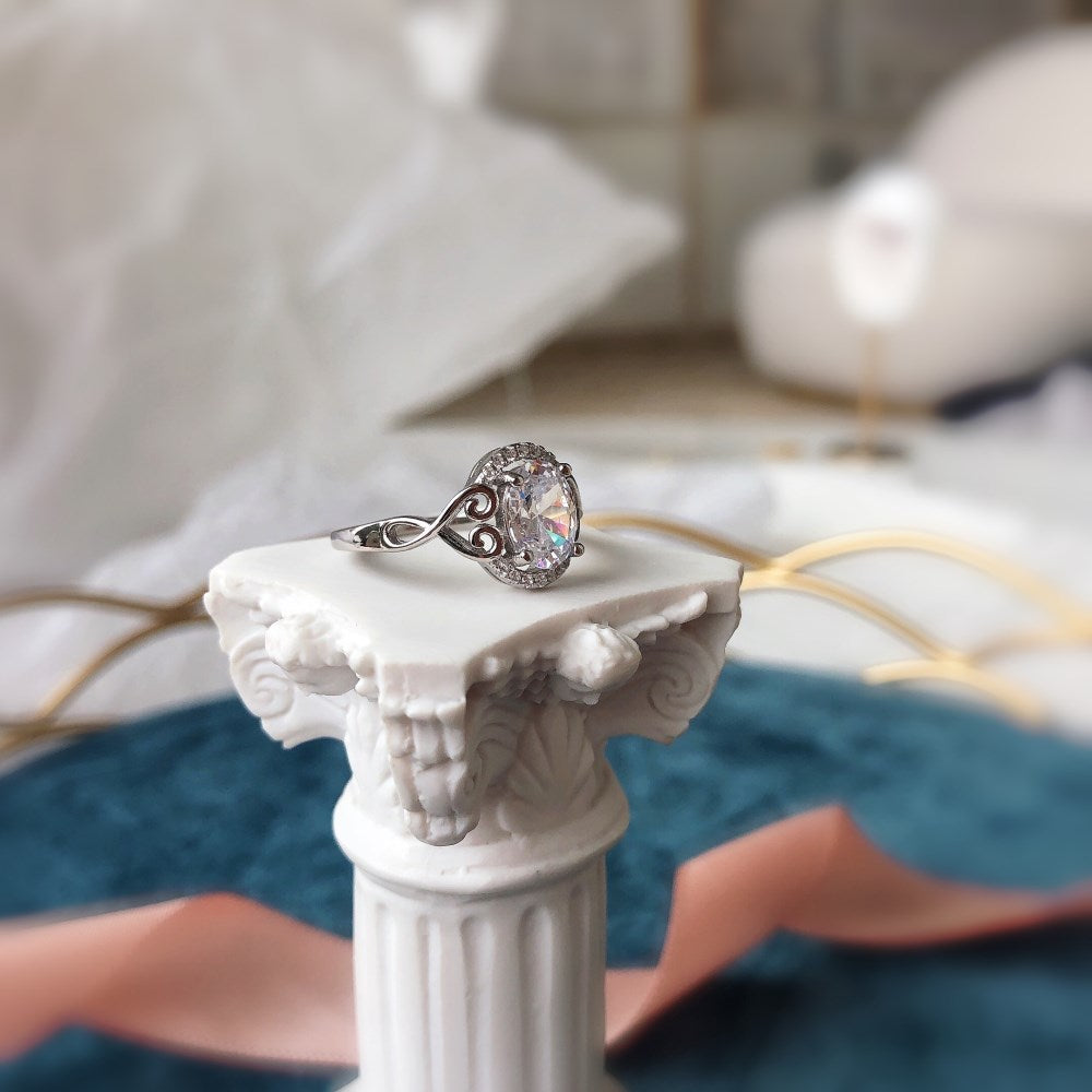 Silver Zircon Oval Cut Twisted Inlaid Halo Ring