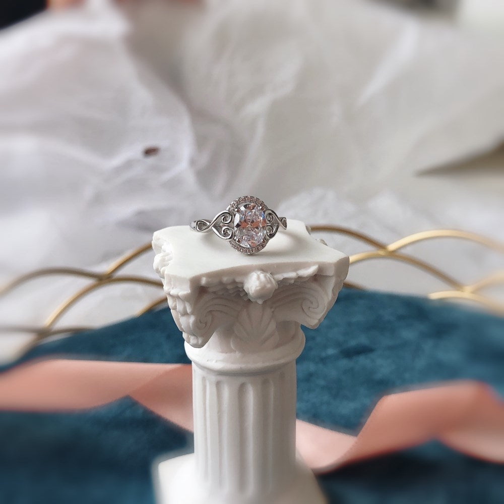 Silver Zircon Oval Cut Twisted Inlaid Halo Ring