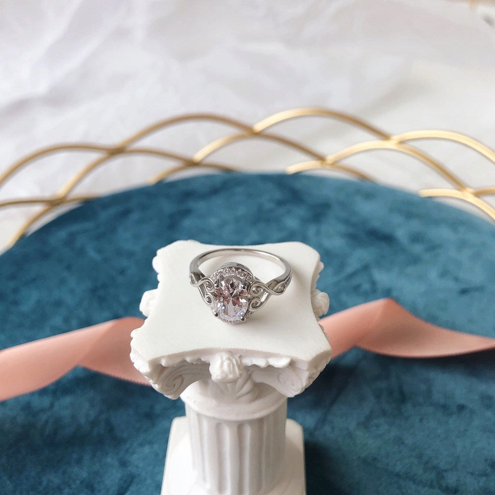 Silver Zircon Oval Cut Twisted Inlaid Halo Ring