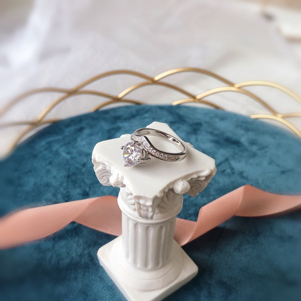 Silver Zircon Round Cut Iced Curved Solitaire Ring