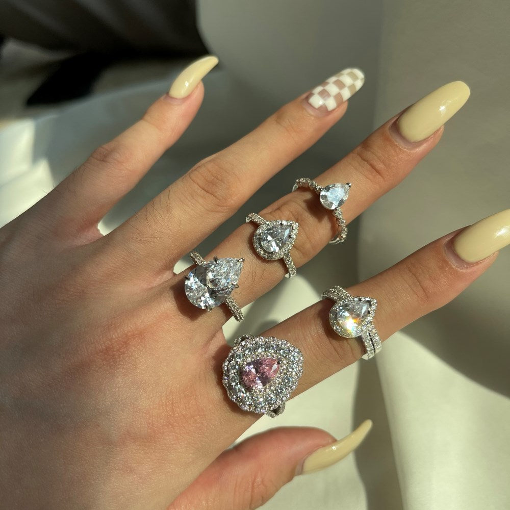 Silver Zircon Pear Cut Inlaid Wrapped Solitaire Ring