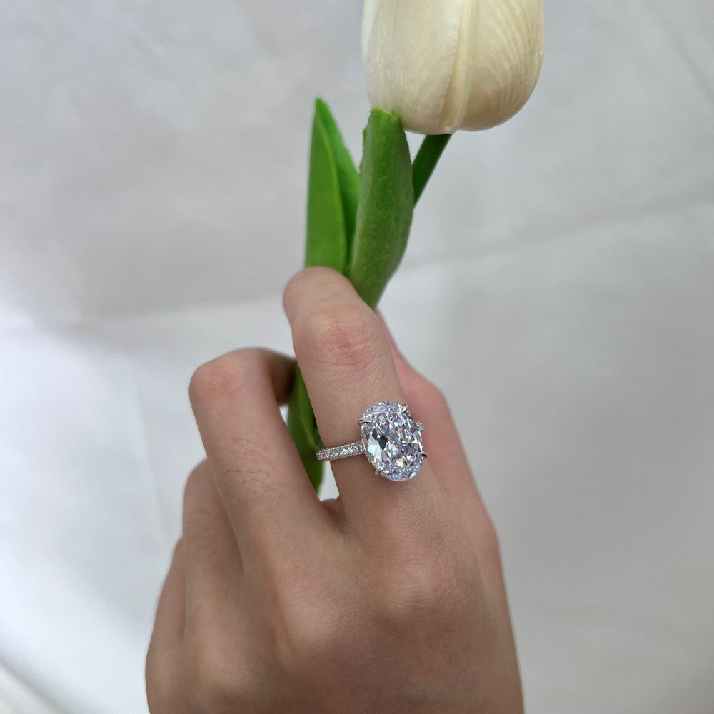 Silver Zircon Oval Cut Iced Solitaire Ring