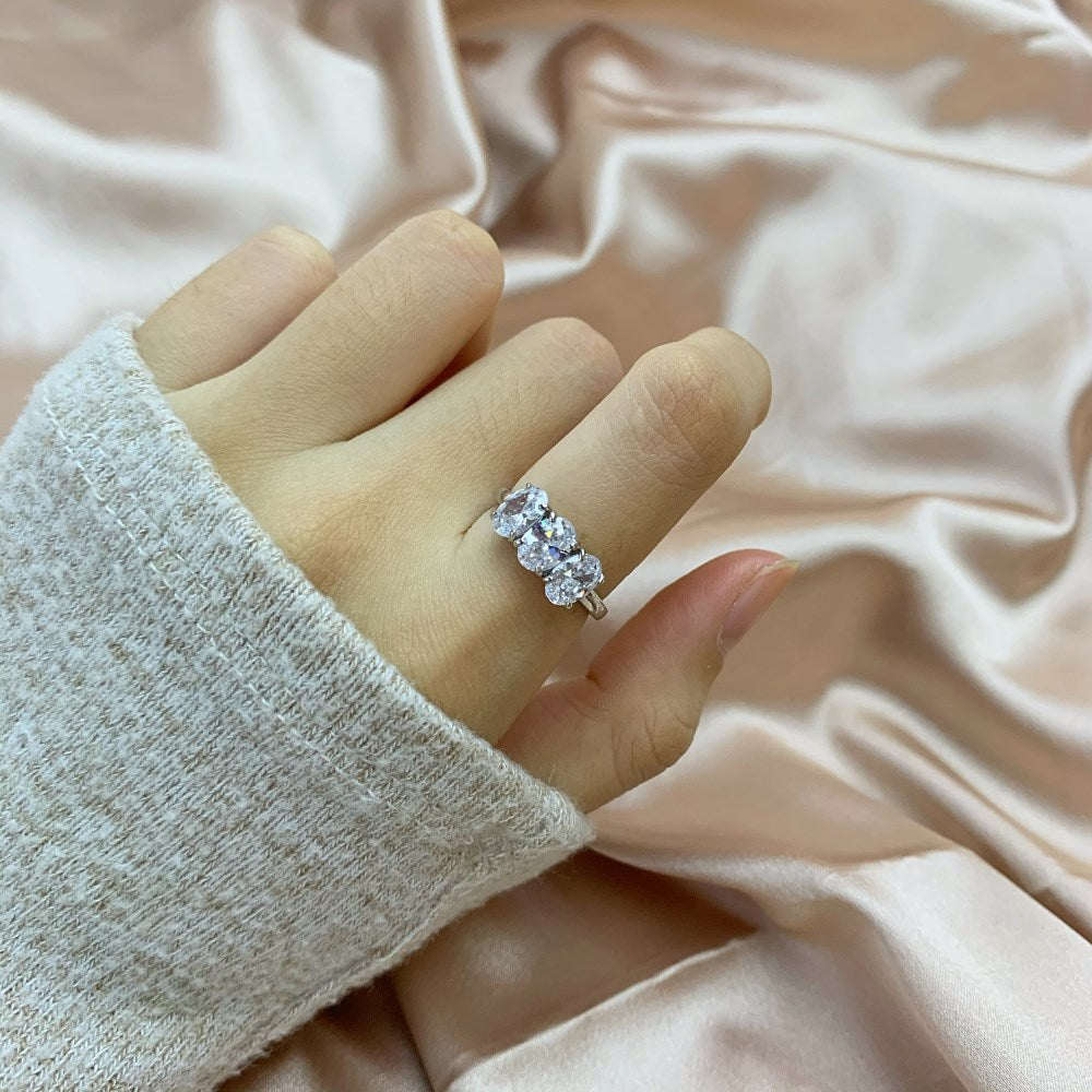 Silver Zircon Oval Cut Inlaid Three Stone Ring